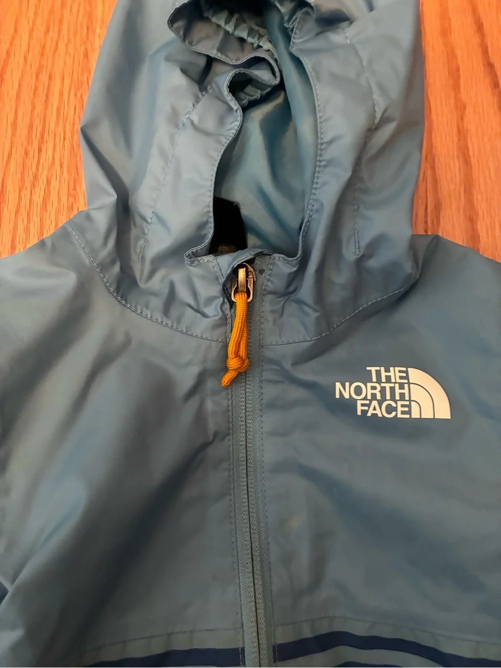The North Face Infant ZIPLINE RAIN JACKET NIAGARA BLUE MINI STRIPE PRINT 6-12 mo